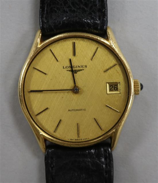 A gentlemans steel and gold plated Longines automatic wrist watch.